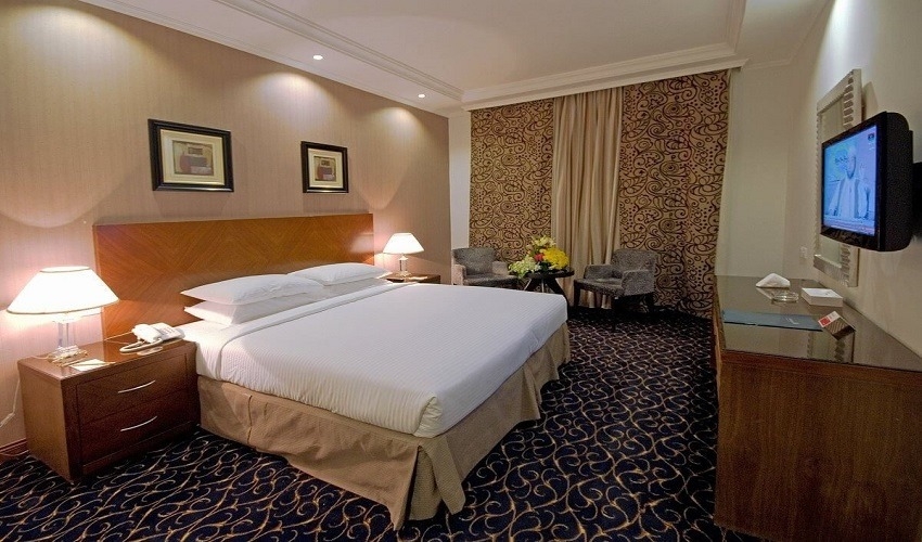 غرف النوم في فندق رمادا الفائزين